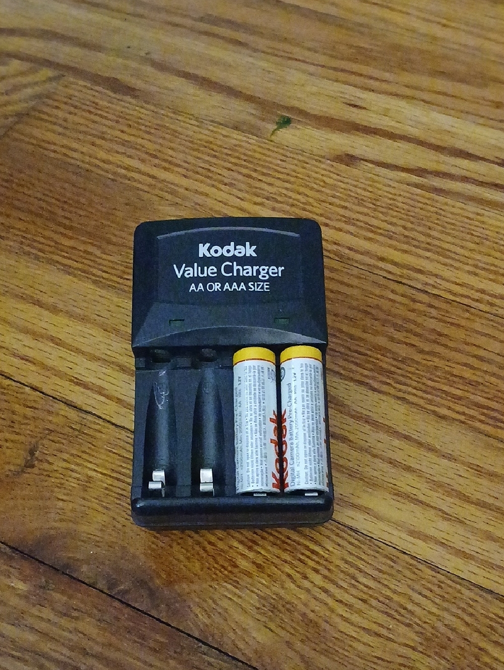 Kodak Black Charger with Yellow-Topped AA Batteries